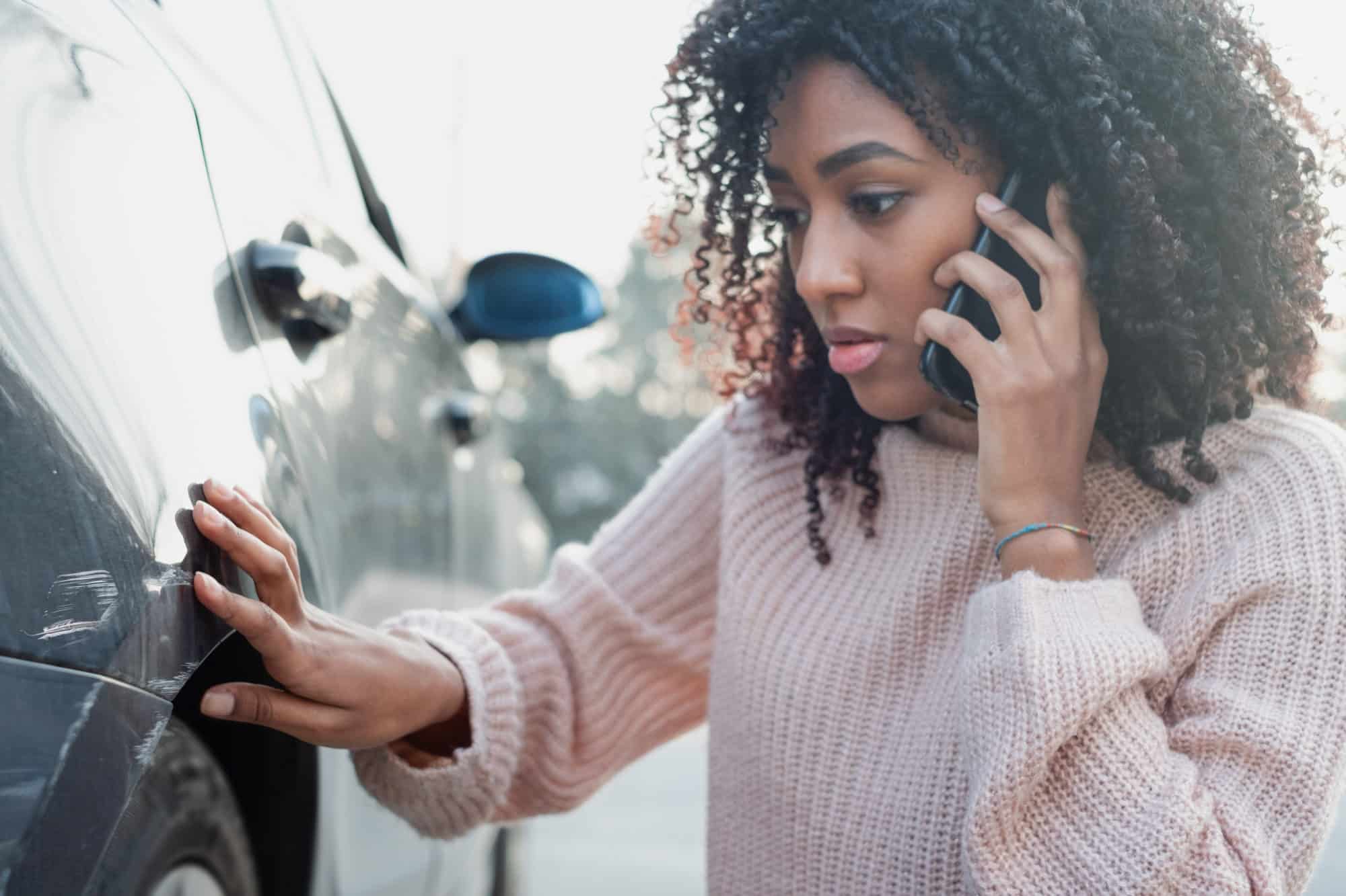 woman calling a car accident lawyer after an accident in Baton Rouge